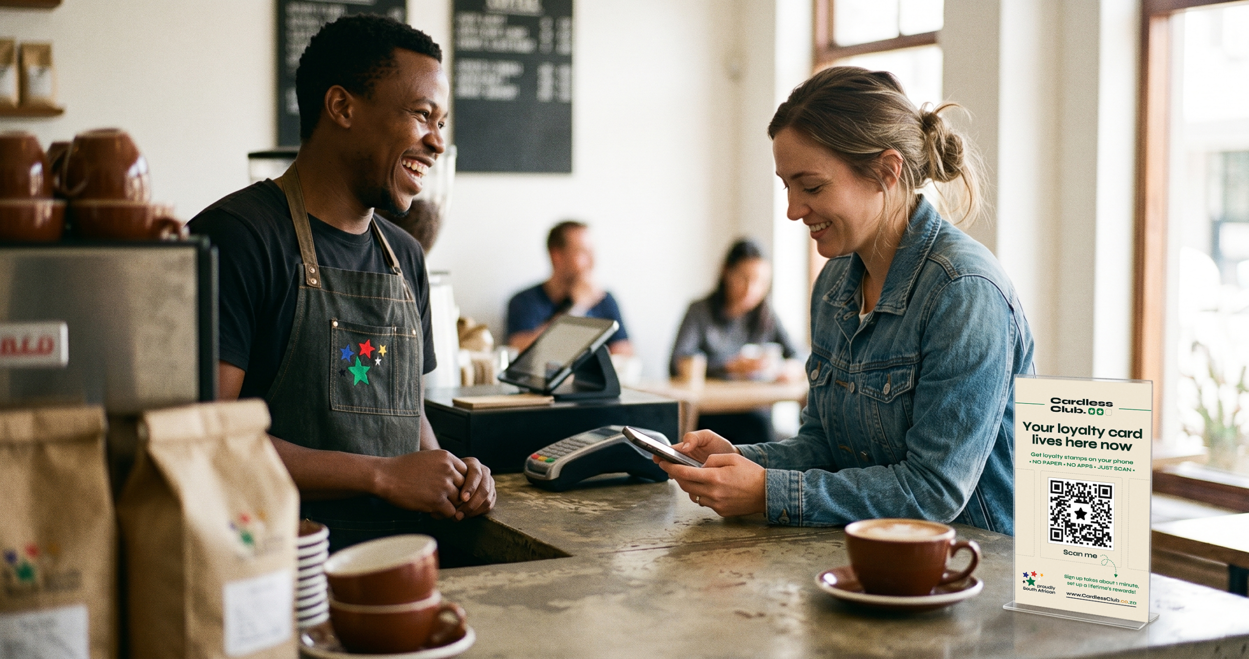 A shop owner welcoming a returning customer at the counter